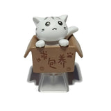 Artisan Keycaps Weiße Katze in einem Karton