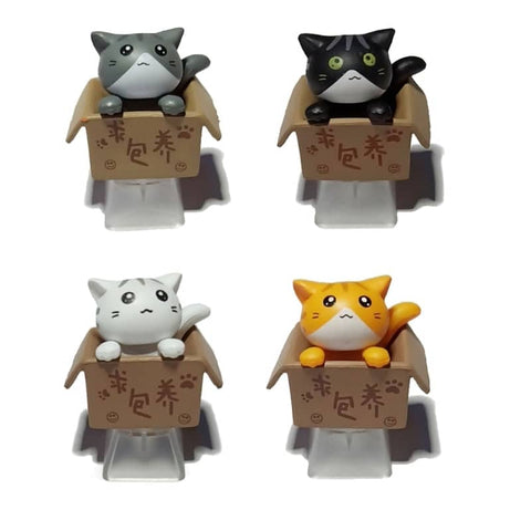 Vier Artisan Keycaps Katze in Kartons